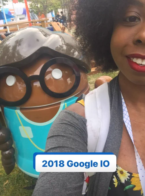 Valerie taking a selfie in front of a android statue with tech that reads 2018 google IO
