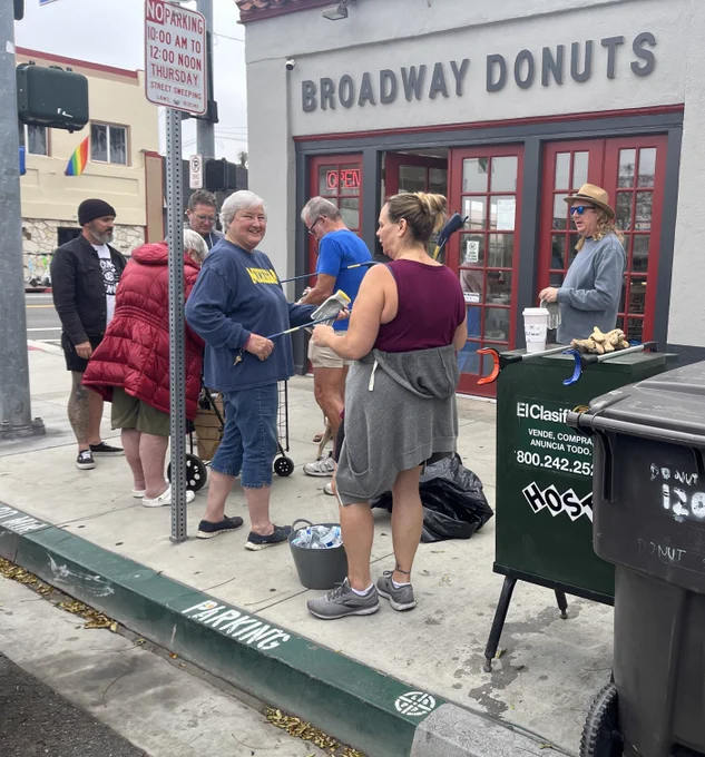 Alamitos Beach Neighborhood Association volunteers taking a much needed break from their hard work.
