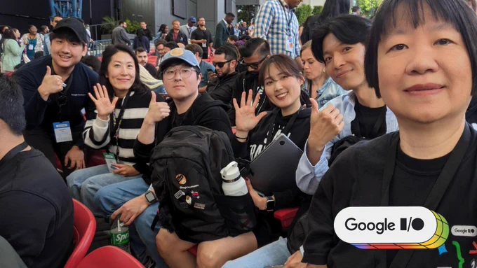 Group photo of six people from the GDE community smiling and making hand gestures at the camera at the Google I/O event