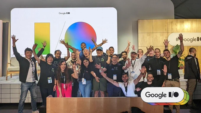 Group photo of multiple people from the GDE community smiling  at the camera at the Google I/O event