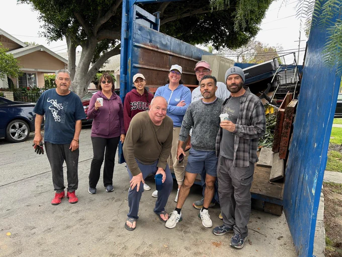 The Craftsman Village Historic District volunteers pose for a picture.
