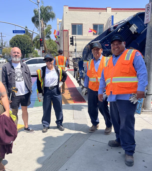 Alamitos Beach Neighborhood Association volunteers pose in their gear ready to start their clean-up.