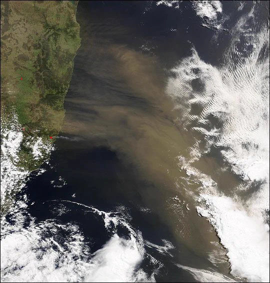 Dust storm blowing off the Australian east coast over the South Pacific. NASA GSFC.
