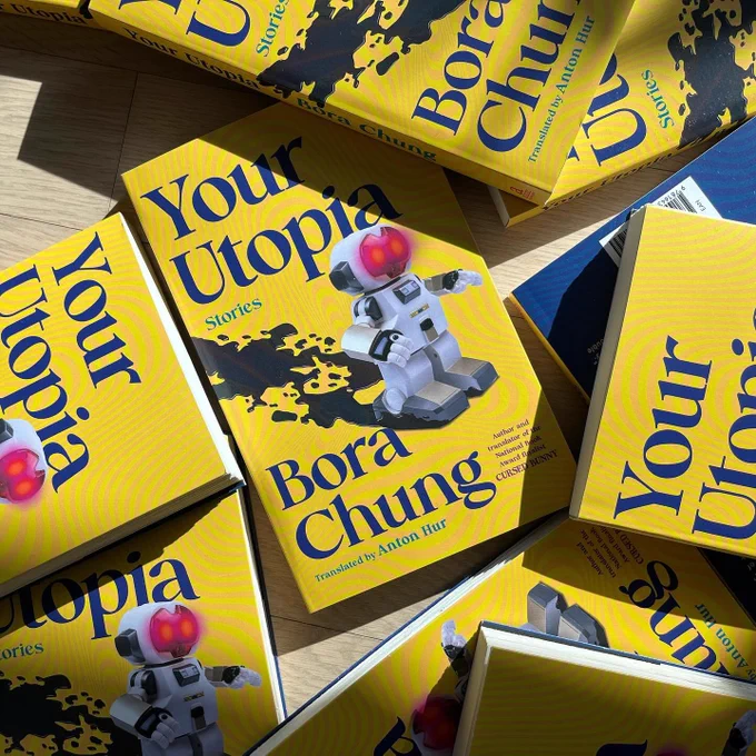 A scattered stack of YOUR UTOPIA
