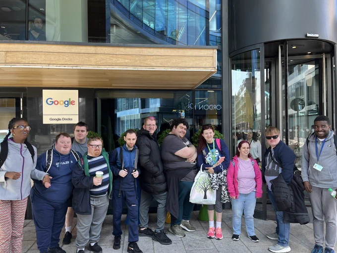 Group of 12 people infront of Google office