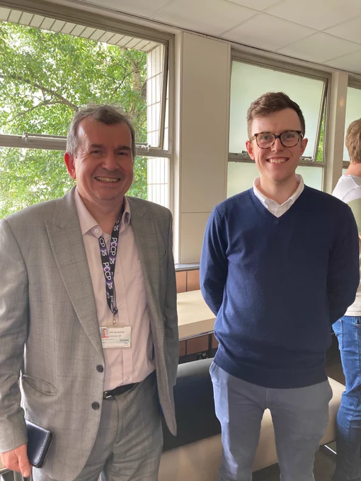 Chris Woodgate with Prof. Mark Newton at the 2024 postgraduate poster session and awards ceremony.