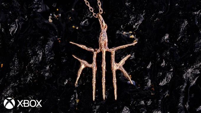 Image of Hellblade II inspired necklace, created by Icelandic jewelry brand Aurum against a dark background with the Xbox logo featured in the bottom left corner.
