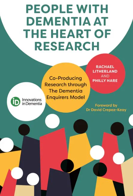 Green and white poster. Text reads: People with dementia at the heart of research. Black, yellow, red, and cream abstract shapes that look like people are at the bottom of the poster.