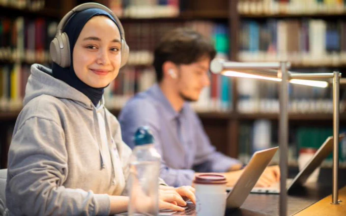 Students enjoying accessable content from Library, Culture, Collections and Open Science.