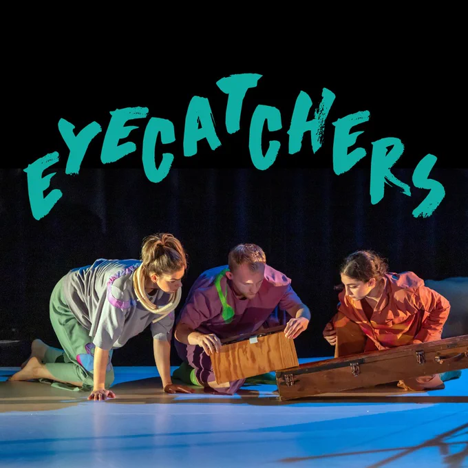 Production photo from Eyecatchers. Three dancers on their hands and knees, all transfixed by wooden contraptions. Above them is the text "Eyecatchers".