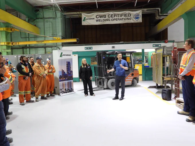 Pierre Poilievre speaking to a group of workers at the Lafarge cement plant in Richmond, BC.