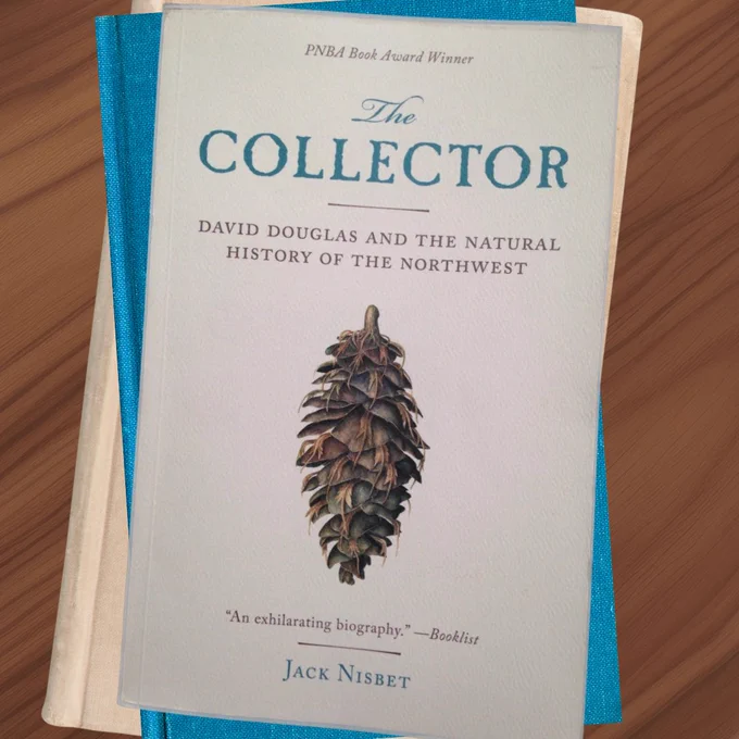 Stack of books on table, "The Collector" by Jack Nisbet on top