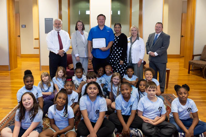 Today, the State Board of Education honored Todd Willis, a teacher at CES: Coldwater Elementary School in the Tate County School District, for being named the 2024 Mississippi Rural Teacher of the Year.  The Program for Research and Evaluation for Public Schools (PREPS)  established the Rural Teacher of the Year award in 2021. The award celebrates educators who show a passion for teaching, learning, and making a difference in smaller schools and communities. 
Willis has dedicated his career to education, focusing on innovative and hands-on learning experiences. He began teaching in 2011 as a substitute teacher and has had various roles, including his current position as a third-grade math, science, and garden educator.  
He has received numerous awards and recognitions for his work, including the Fulbright Scholar in 2019 for the U.S. Teacher Exchange Program in India, the Arkansas Department of Agriculture School Garden of the Year in 2021, and grants from the Mississippi Department o