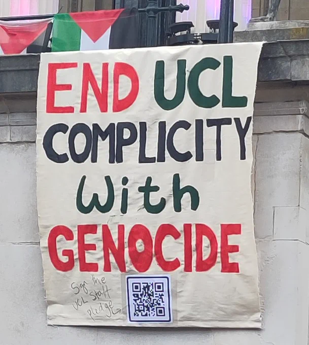Banner which says end UCL complicity with genocide, in the red, green and black colours of the Palestinian flag.