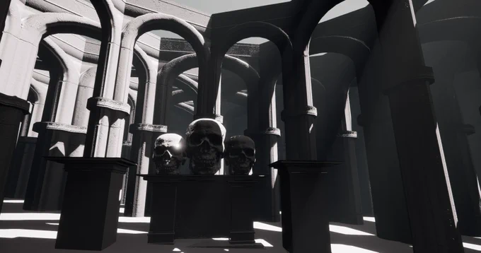 Three Skulls are placed on a strange altar. There is a surreal construction of pillars and columns in the back. The scene is in black and white.