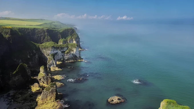 Looking towards Portrush and the sea and cliffs