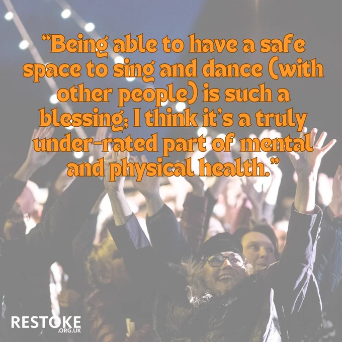 A picture of a crowd of people in coats and hats smiling with their hands reaching up. The quote reads "Being able to have a safe space to sing and dance (with other people) is such a blessing: I think it's a truly underrated part of mental and physical health"