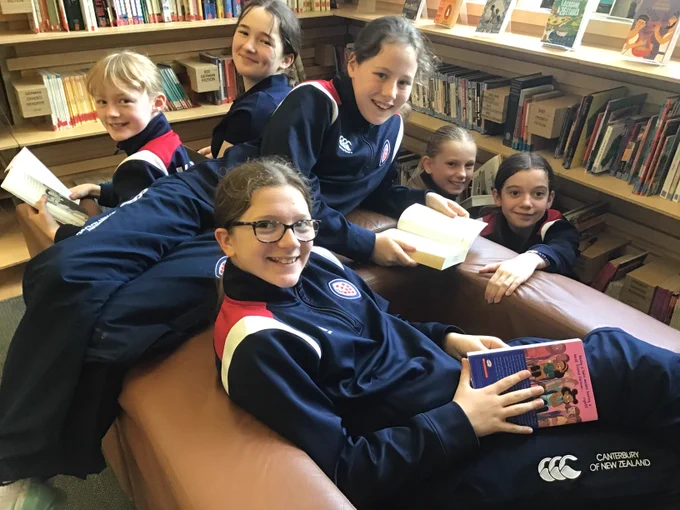 Children reading in the Library