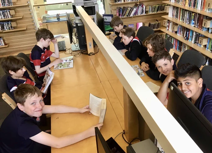 Children reading in the Library