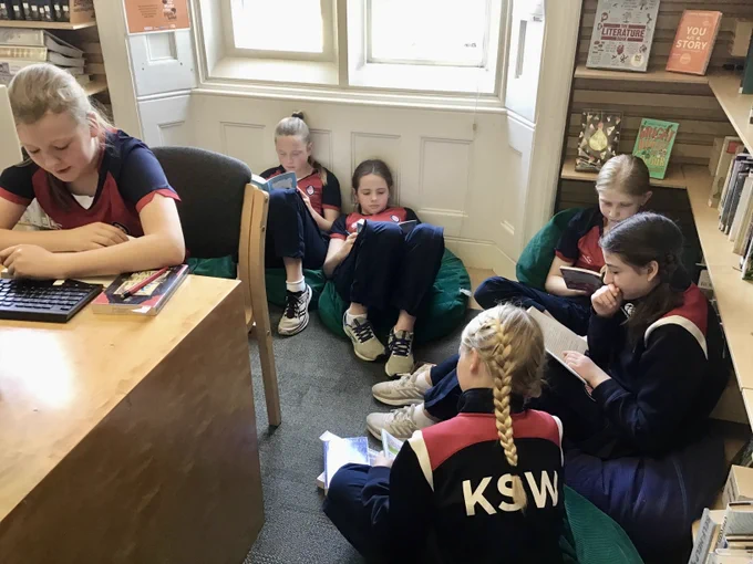 Children reading in the Library
