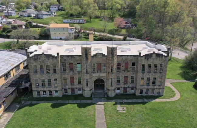 Image of stone masonry school in Calhoun County, WV.