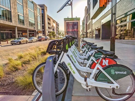 Several BikeLNK bikes docked at at a station in downtown Lincoln.