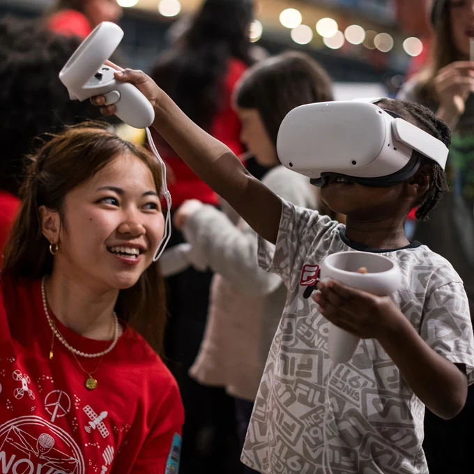 Visitors engage with a virtual reality demonstration