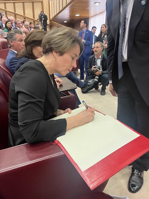 Governor Healey signing climate protocol.