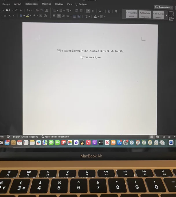 A photo of a MacBook Air screen. A Word document is visible. It says: Who Wants Normal? The Disabled Girl’s Guide To Life by Frances Ryan.