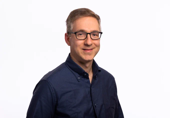 Color, head-and-shoulders image of Ralph Kleiner against a white backgrop.