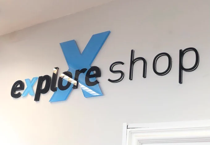 Explore shop sign