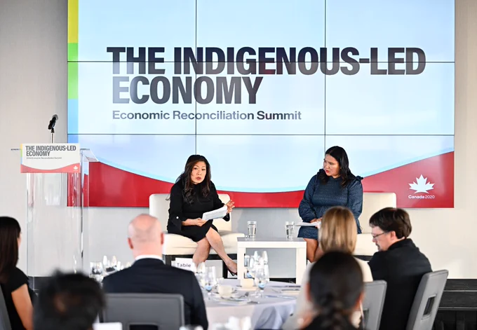 The Honourable Mary Ng, left, and Tiara Folkes, right, seated for an armchair discussion.