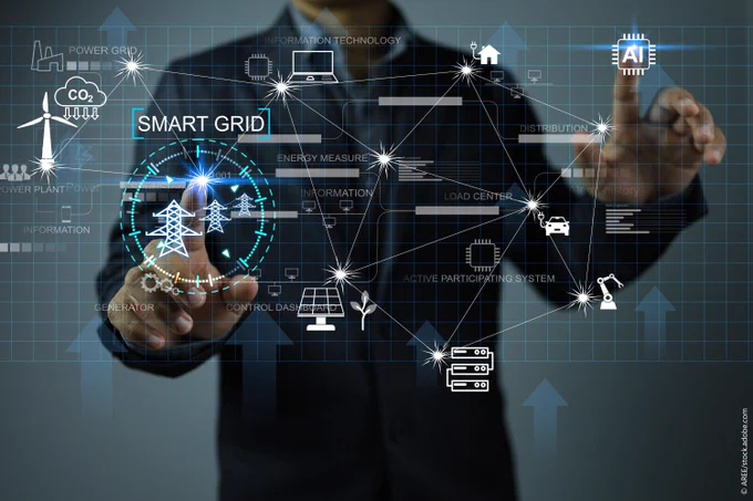 A person in a irtual control panel presses inscription smart grid.