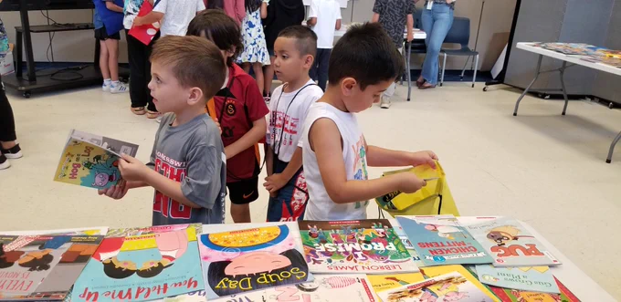 Boys looking at books 