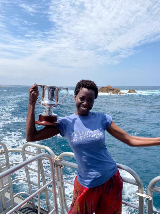 Eunice with the 2019 World Changing Alumni Award cup