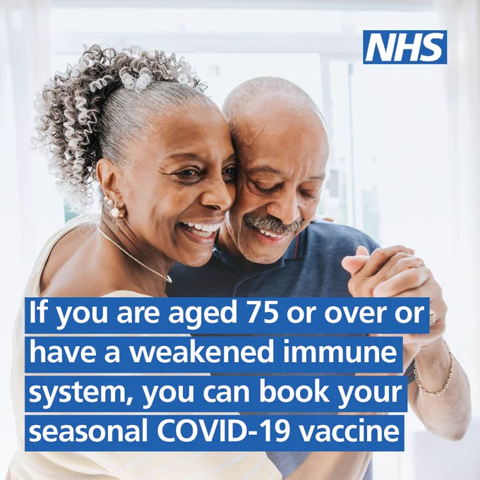 image of two happy people getting covid vaccines