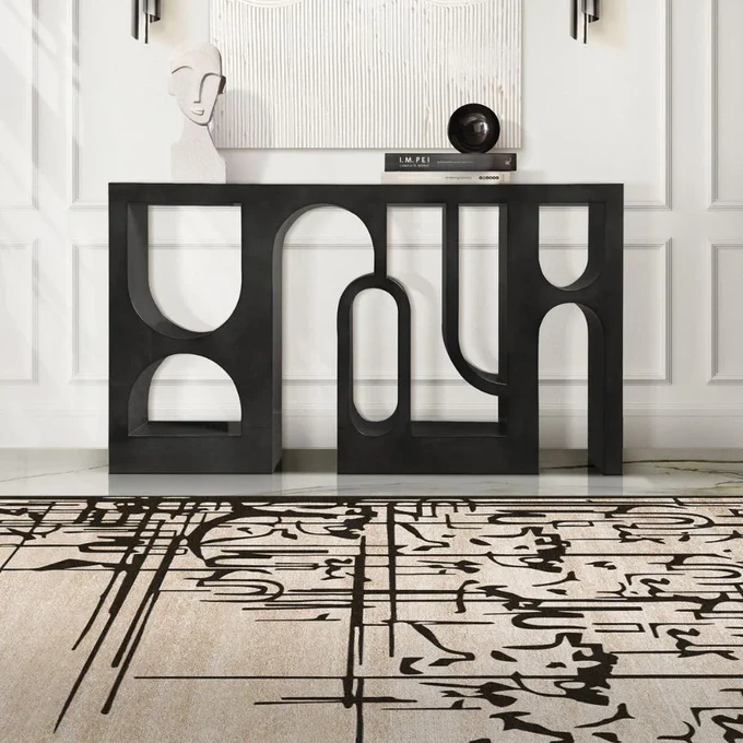 Hand-tufted artistry for your floor. The BLACK INK Rug features a captivating graphic design on luxurious botanical silk. A conversation starter for design enthusiasts.