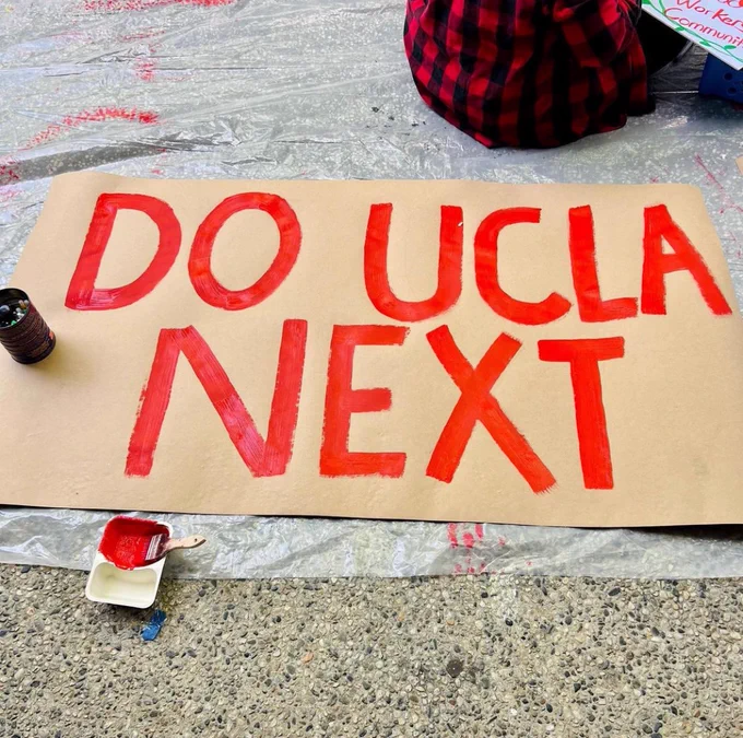 Hand painted banner from UCSC saying Do UCLA Next