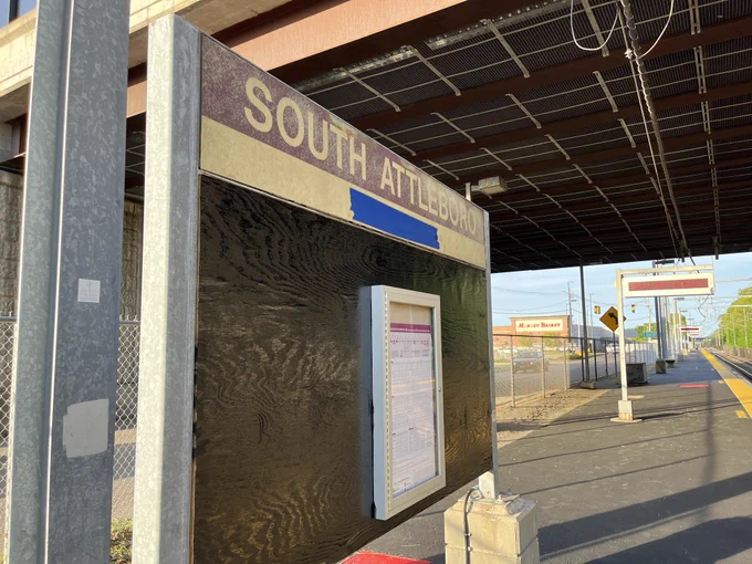 A wayfinding sign at South Attleboro Commuter Rail station listing the name of the station.