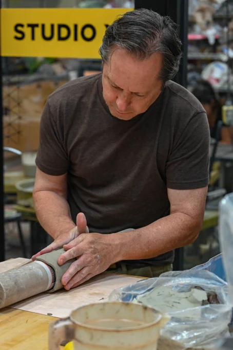 Student creating handmade ceramics