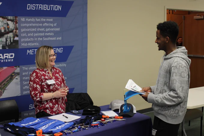 Student speaks with an employer at the LYH Intern Connect event.