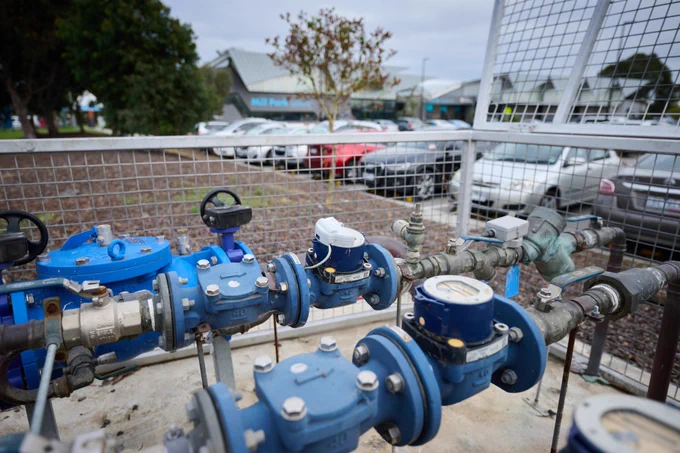Water meter outside Mill Park Leisure centre with data loggers attached.