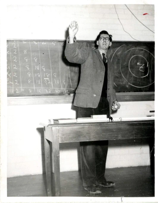 Professor Harold Springall delivering a chemistry lecture in the 1950s.