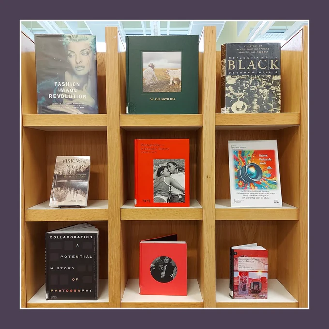  A picture of 8 photography books on a shelf 
