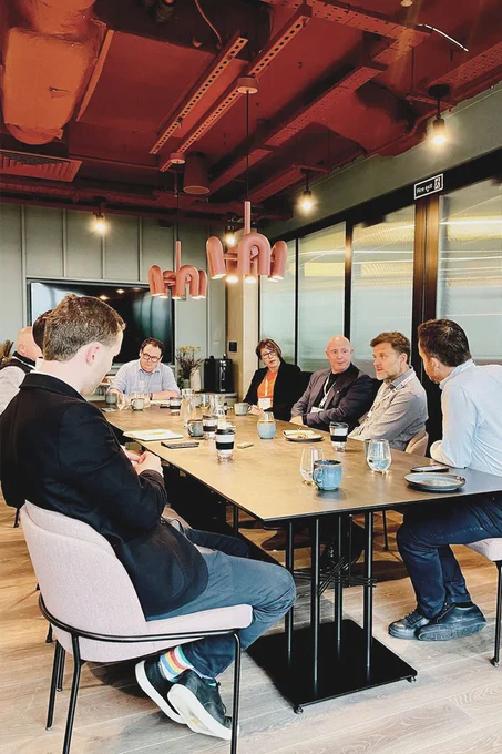 Roundtable panel including chair Simon Creasey from BE News, Sam Smith from Dandara Living, Damien Sharkey from HUB, Louise Bangee from urbanbubble, Justin Harley from Yardi, Mark Woodrow from Packaged Living, Chris Trunkfield from Moda, and Colin Ainger from HTA Design LLP design