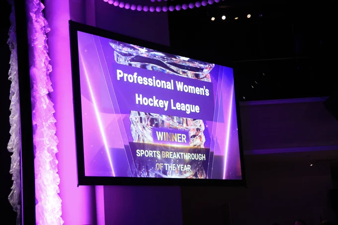 The screen at the SBJ Sports Business Awards ceremony announcing the Professional Women’s Hockey League as the winner of the Sports Breakthrough of the Year. 
