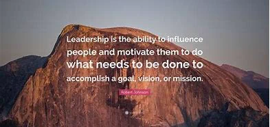 Picture of mountain with text written across ' Leadership is the ability to influence people and motivate them to do what needs to be done to accomplish a goal, vision or mission.' Robert Johnson