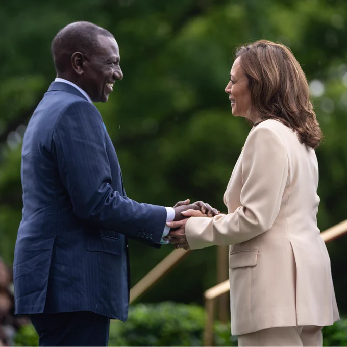 Vice President Harris shakes hands with President William Ruto of Kenya.
