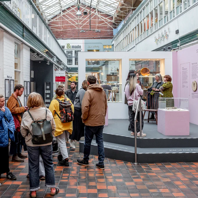 Group of people inside Manchester Craft and Design Centre