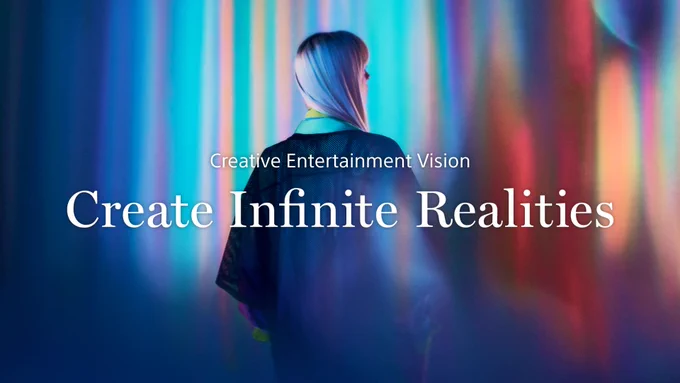 "Create Infinite Realities," the key message of the Creative Entertainment Vision introduced at the Sony Group's Corporate Strategy Meeting 2024, is displayed against the silhouette of a woman from behind with a brightly colored background.